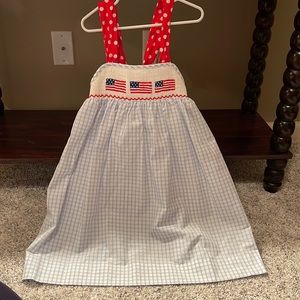 Brand: Smocked Polkadot. Size:5. NWT. Smocked flags.